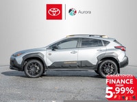 The 2024 Subaru Crosstrek Wilderness AWD in a striking silver finish with an automatic AWD transmiss... (image 2)