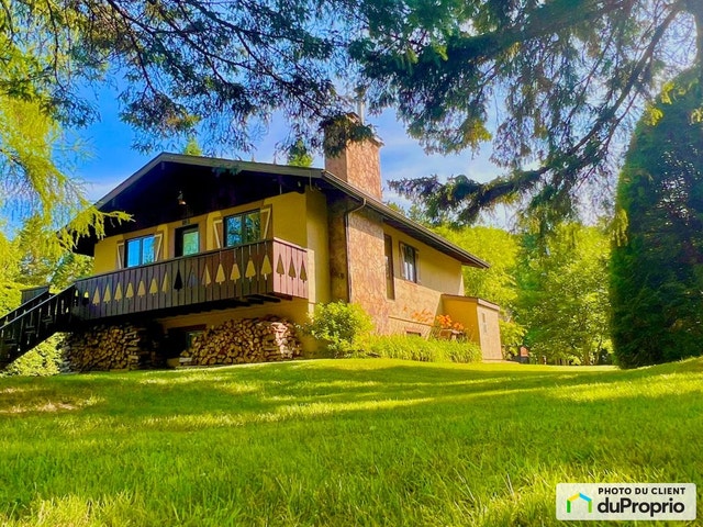 $579,000 - Bungalow for sale in St-Sauveur — photo 1