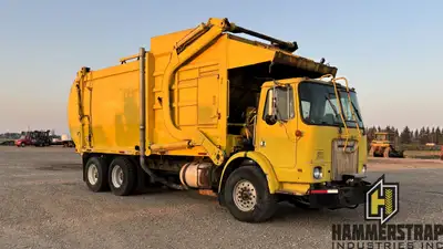 1998 VOLVO WX Tandem Axle Front Load Refuse Waste Sanitation Garbage Collection Packer Truck Cummins...