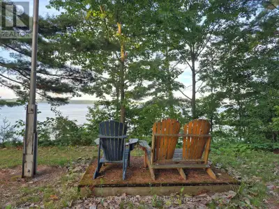 A Rare Waterfront Opportunity Awaits! Welcome to your future retreat on sought-after Champlain Road...