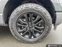 Commanding and sophisticated, the 2024 Ford F-150 LARIAT Crew Cab Pickup effortlessly merges heavy-d... (image 8)