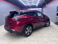 The 2021 Nissan Murano AWD SV in a striking Red finish promises confidence and capability with its a... (image 2)