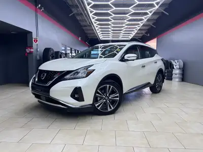 The 2021 Nissan Murano AWD SL in an elegant White finish offers exceptional balance and control with...