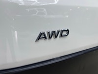 The 2024 Ford Transit Cargo Van T-250 130 Low Rf 9070 GVWR AWD in pristine white is a formidable veh... (image 3)
