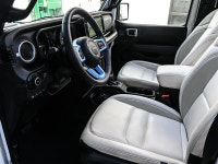 The 2024 Jeep Wrangler 4xe High Altitude 4 Door blends open-air freedom with plug-in hybrid power in... (image 9)