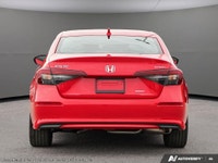 The 2025 Honda Civic Sedan Hybrid Sport eCVT is a standout choice with its vibrant red exterior and... (image 4)