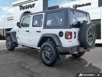 This Jeep Wrangler boasts a Intercooled Turbo Premium Unleaded I-4 2.0 L/122 engine powering this Au... (image 4)