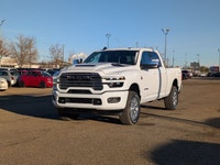 The 2026 Ram 3500 Laramie Crew Cab in Bright White combines heavy-duty capability with premium comfo... (image 1)