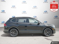 New Price! Odometer is 13972 kilometers below market average! Deep Black Pearl 2024 Volkswagen Tigua... (image 5)