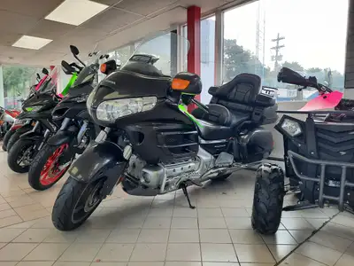 The 2010 Honda Gold Wing GL1800 is a flagship touring motorcycle renowned for long-distance comfort,...