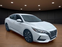 The 2023 Nissan Sentra SV CVT in pristine White is a front-wheel-drive sedan that handles beautifull... (image 3)