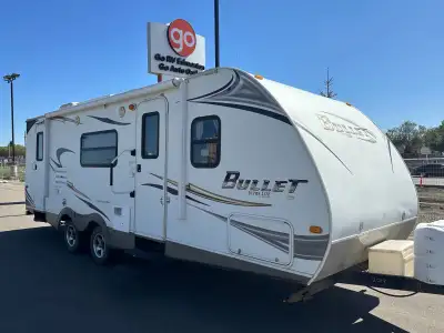 The 2011 Bullet 246RBS is a lightweight travel trailer with a smart, spacious layout designed for co...