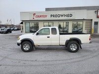 Built to tackle any adventure or workday, this 2004 Toyota Tacoma Extended Cab Pickup combines legen... (image 1)