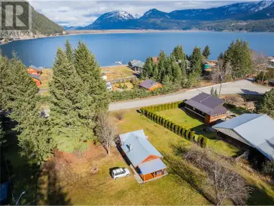 Escape to your personal lakeside haven! This charming cottage, set on a flat lot in Lardeau, BC, off...