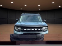 The 2021 Ford Bronco Sport Outer Banks in a striking blue finish with its capable 4x4 drivetrain off... (image 2)