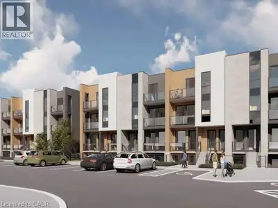 PRICE REDUCTION + TWO OWNED PARKING SPACES! This stacked townhome in Huron Park presents exceptional...