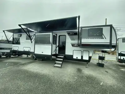EAST TO WEST Ahara fifth wheel 380FL highlights: Rear Master Bath Kitchen Island with Extensions 24i...
