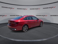 // ACCIDENT FREE!! // // SINGLE OWNER! // Finished in red with a black interior, this 2026 Volkswage... (image 7)