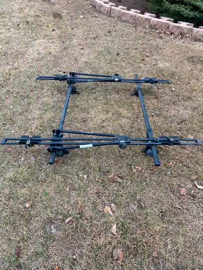 Thule roof top bike rack, Fits two bikes $250.00 Call 403-831-4100