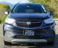 Introducing the 2022 Buick Encore Preferred AWD, a striking black SUV that combines all-wheel drive... (image 2)