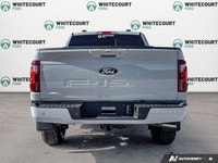 Immerse yourself in the bold design and capability of the 2026 Ford F-150 XLT, a striking all-white... (image 5)