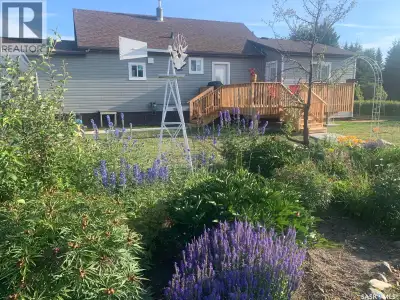 Turn key house with beautiful gardens is awaiting you! This 1206 sq ft 3 bedroom/2 bath home has und...