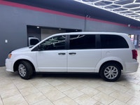 The 2019 Dodge Grand Caravan Canada Value Package in pristine white is the perfect blend of practica... (image 3)