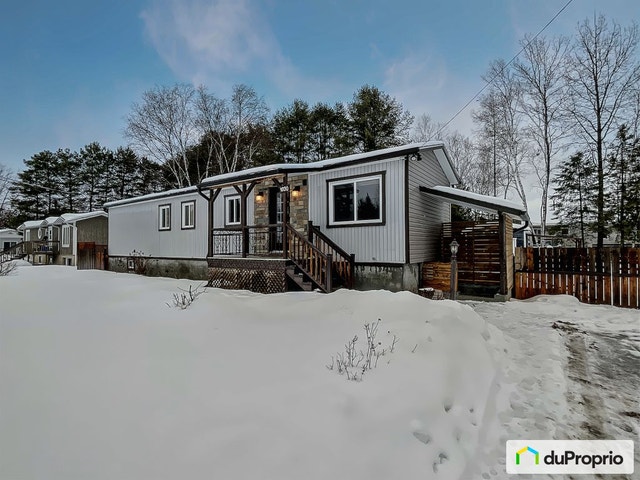$339,000 - Bungalow for sale in Mont-Tremblant — photo 1