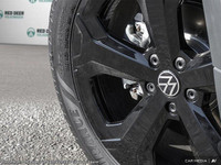 The 2025 Volkswagen Taos Comfortline Black Edition AWD is a striking blend of style and capability w... (image 6)