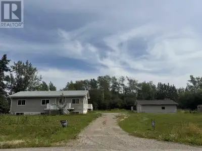 5 bedroom 3 bathroom home on 1 acre in Baldonnel just blocks away from the school. Primary bedroom h...