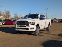 The 2026 Ram 3500 Laramie Crew Cab in Bright White combines heavy-duty capability with premium comfo... (image 1)