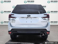 The pre-owned *2021 Subaru Forester Touring* is a versatile SUV built for drivers who value safety,... (image 5)