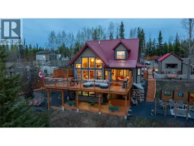 Located on the shores of Cluculz Lake, this stunning 3-bedroom lakefront home offers breathtaking la...