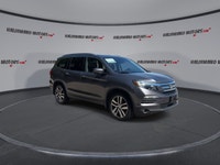This used 2018 Honda Pilot Touring AWD is a roomy, family-ready SUV with smart features and proven V... (image 1)
