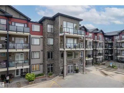 Top-floor penthouse in Rutherford has an airy open floor plan, soaring ceilings, and a cozy gas fire...