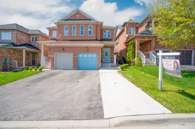 This freshly painted, beautifully upgraded, carpet-free home is located in the heart of the sought-a...