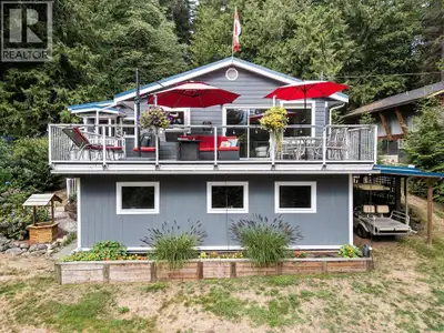 Escape the city and relax in this charming 3-bedroom + den, 2-bathroom home on Keats Island. The ope...