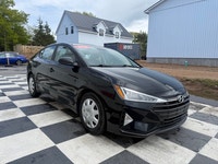 A practical compact sedan with efficient performance, modern convenience features, and a comfortable... (image 2)