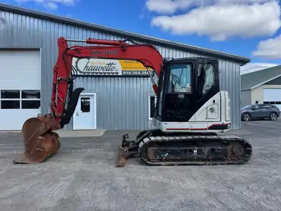 Excavatrice avec Tractions en Acier Patins en Caoutchoucs Lame Cabine 2 Godets Attache Rapide Pouce...