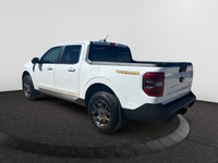 Check out this vehicle's pictures, features, options and specs, and let us know if you have any ques... (image 2)