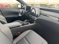 Curbside, this 2026 Lexus RX350h Premium expresses its sophisticated style with a sleek body design... (image 9)
