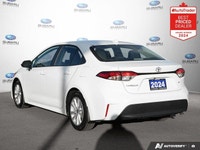 Recent Arrival! Odometer is 14620 kilometers below market average! White 2024 Toyota Corolla LE SUNR... (image 2)