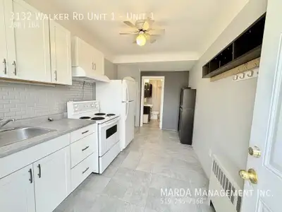 Welcome to 3132 Walker Rd Unit 1, a newly renovated 2-bedroom, 1-bathroom main floor unit that combi...
