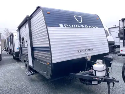 Keystone Springdale Mini travel trailer 1660RB highlights: Full Rear Bath Front Olympic RV Queen Bed...