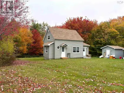 Nestled on 2 acres of private land, this charming, well-kept home is surrounded by mature trees, off...