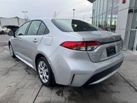 This 2022 Toyota Corolla LE is ready for action from every angle. Sleek J-shaped bi-beam LED headlam... (image 1)