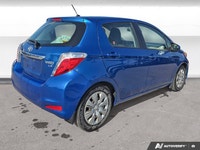 Experience efficient and reliable driving with this 2013 Toyota Yaris. Finished in eye-catching Blaz... (image 4)