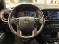 Introducing the 2022 Toyota Tacoma TRD Sport, a robust and stylish pickup truck that combines advanc... (image 8)