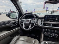 This 2021 GMC Yukon SLT is powered by a robust 5.3L V8 engine paired with a refined 10-speed automat... (image 8)