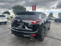 Immerse yourself in elevated sophistication with the 2025 Acura RDX Platinum Elite A-Spec, a stunnin... (image 4)